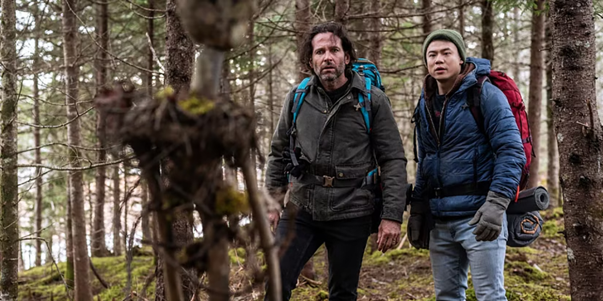 boyd-stevens-and-kenny-liu-find-a-creepy-stick-doll-in-the-woods-in-from-season-3